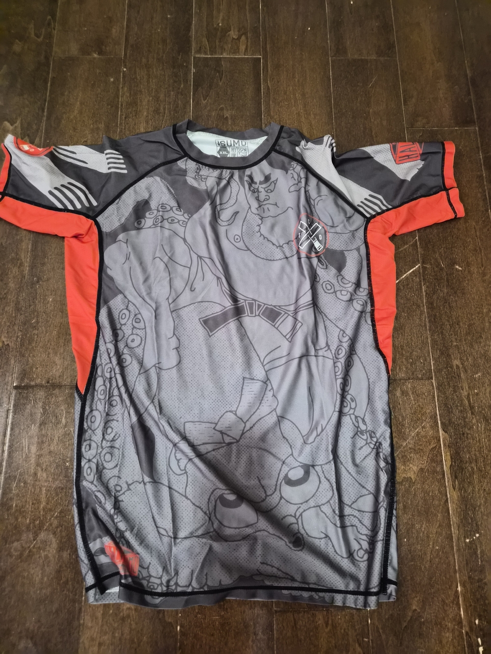 Tap Cancer Out Gray Athletic Rash Guard with Red Accent Graphic